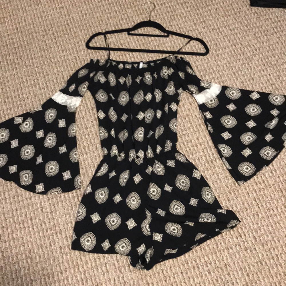 Beautiful bell sleeve romper, wore once, like new
